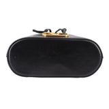Black mini bucket crossbody bag back view with gold hardware and top handle straps