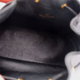 Black bucket crossbody interior lining with textured leather finish