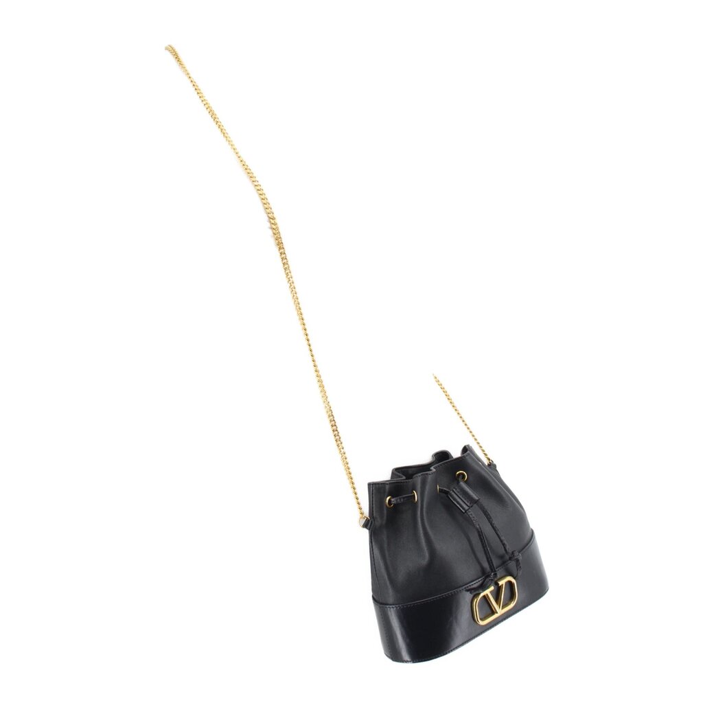 Black mini bucket crossbody bag with drawstring top and long gold chain strap