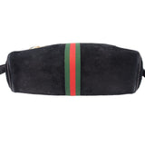 Black suede crossbody bag with centered green-red web stripe panel