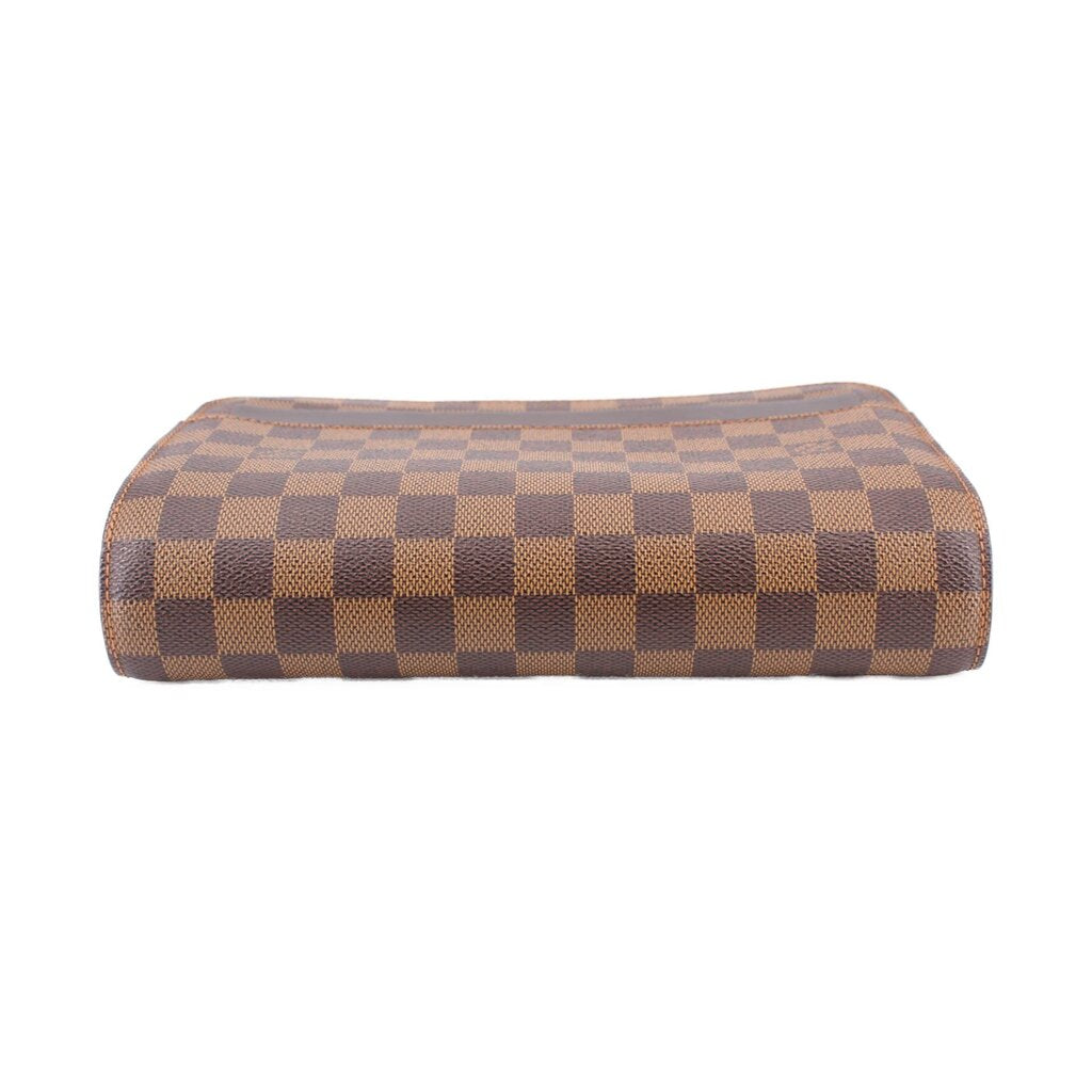 LOUIS VUITTON Damier Ebene clutch bag top view with checkered canvas and curved profile