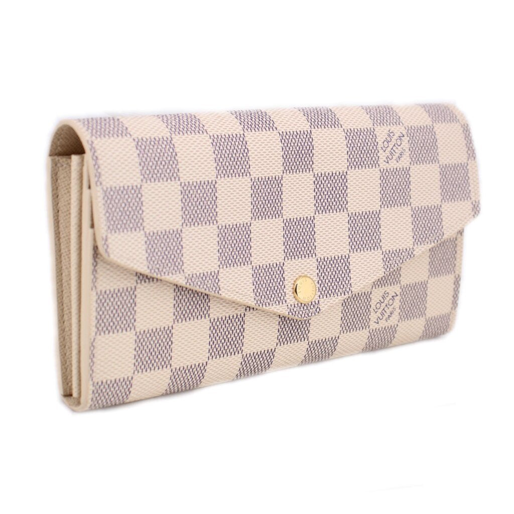 Damier Azur checkered wallet, side view with fold-over flap and gold snap