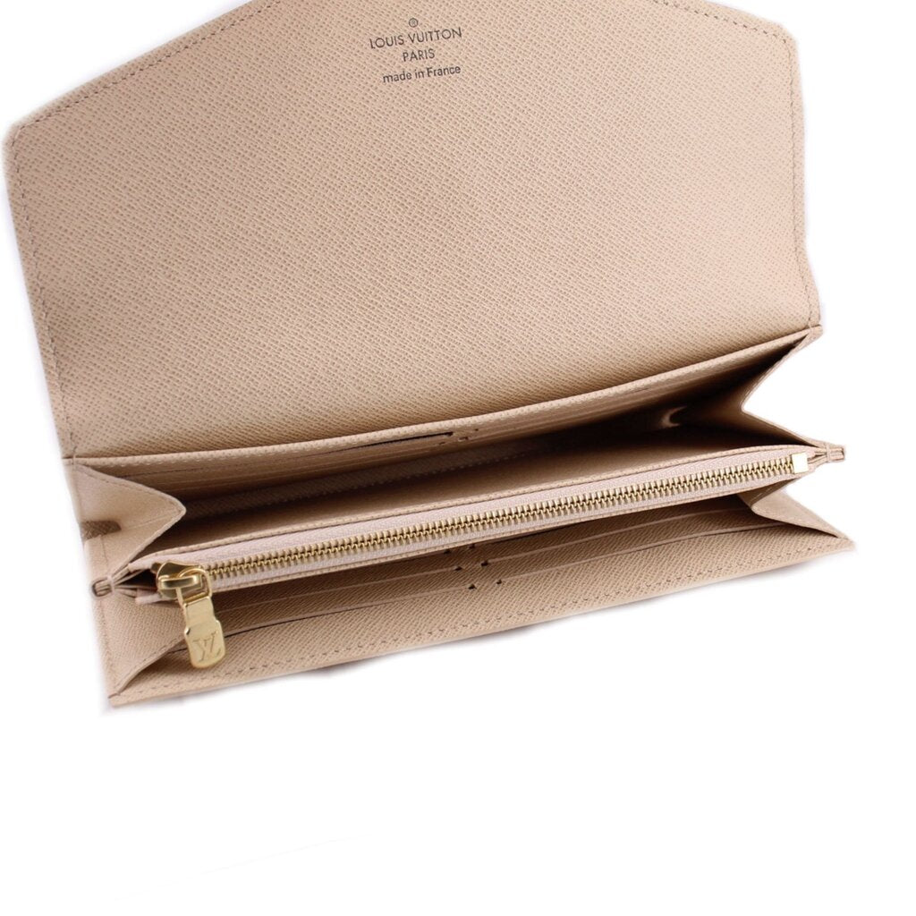Damier Azur wallet open showing beige interior and gold zipper pull