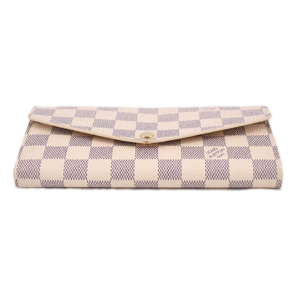 Damier Azur checkered wallet top view with gold snap and flap
