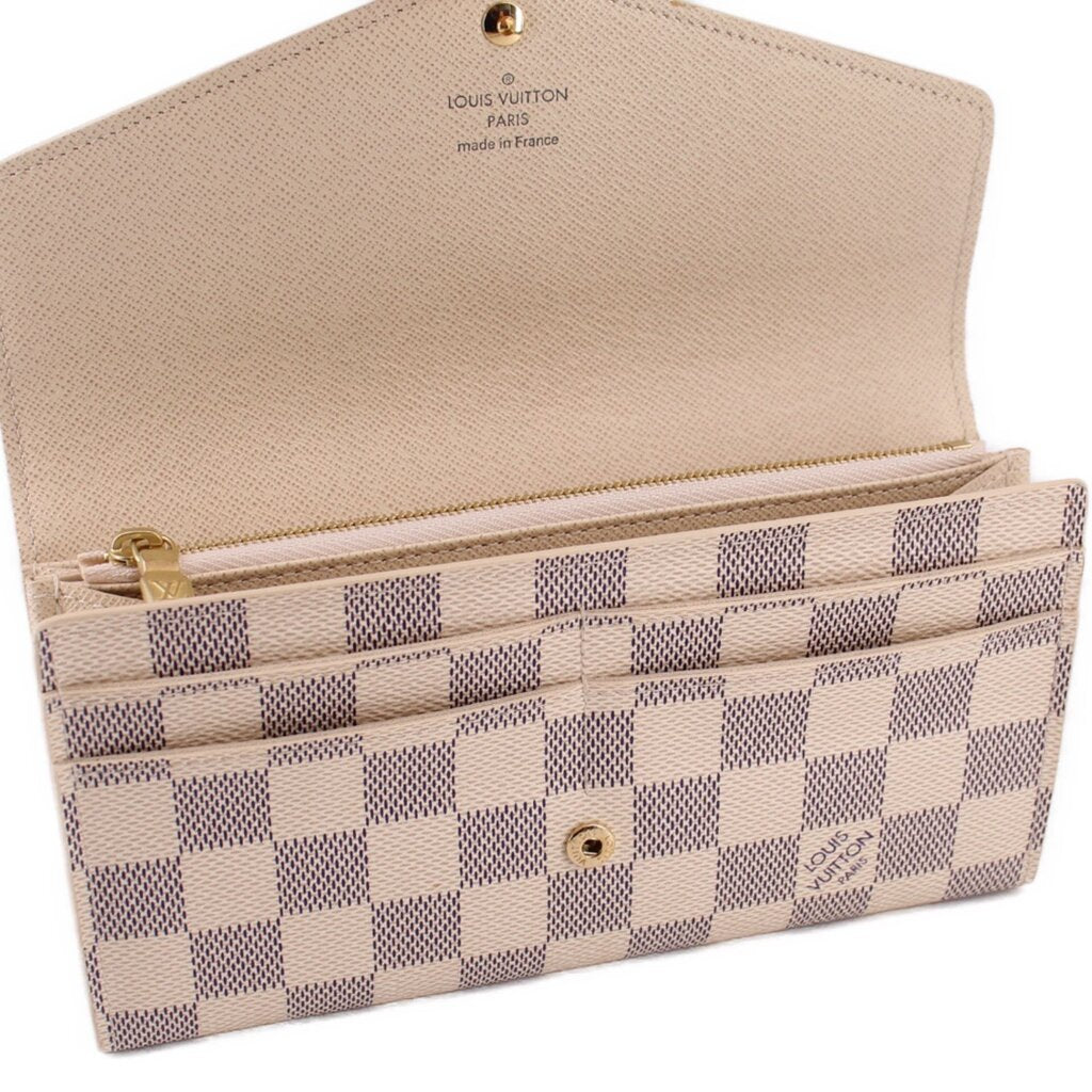 Damier Azur wallet interior with gold zipper trim and LOUIS VUITTON Paris text