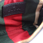 Large emblem shoulder bag lining with multicolor stripe and embossed leather patch