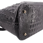 Brahmin Asher medium tote bag close-up, black croc-embossed leather side with snaps