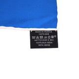 Blue silk scarf care label reading Made in France and 100% silk