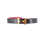 Black leather belt with gold-tone buckle and red strap detail at edge