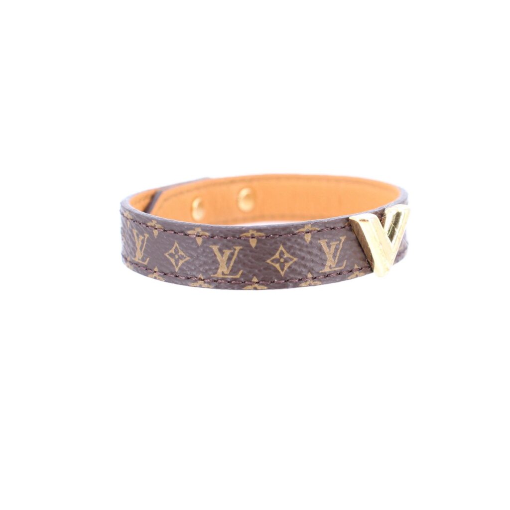 Monogram V bracelet with gold V centerpiece on brown canvas band, orange interior