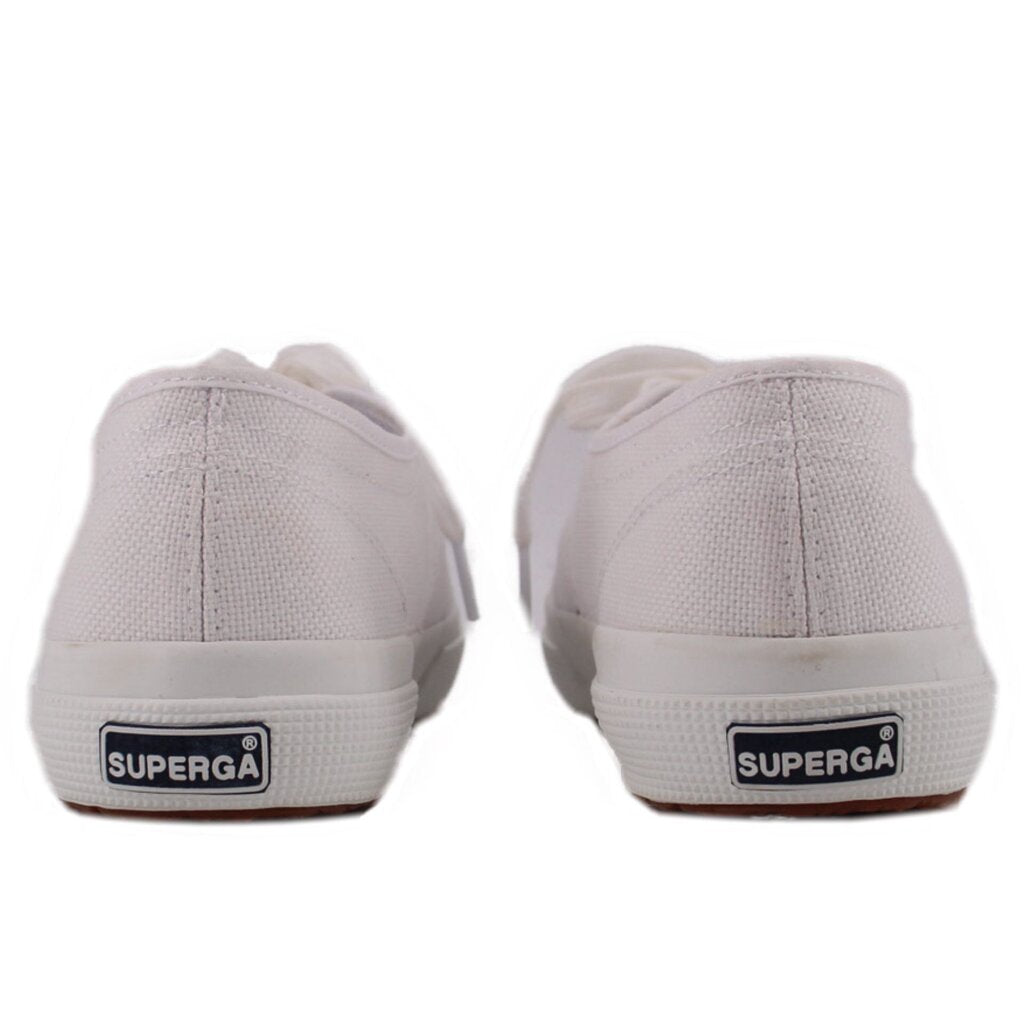 White canvas sneakers with SUPERGA heel label and rubber toe bumper.