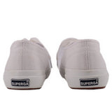 White canvas low-top sneakers with heel tab and branded rubber outsole