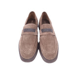 Pair of taupe suede loafers with square buckle strap and stitched vamp