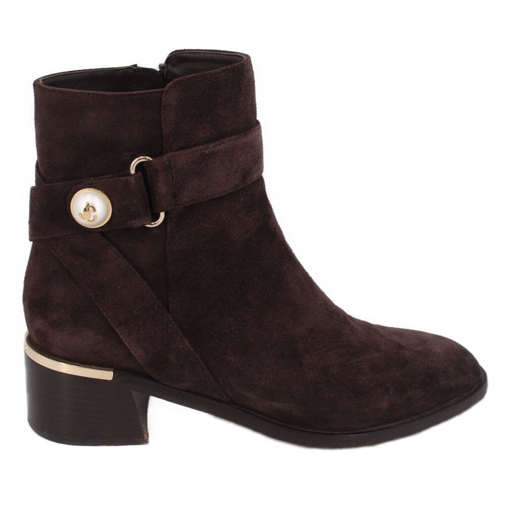 JIMMY CHOO brown suede ankle bootie with decorative buckle at the ankle