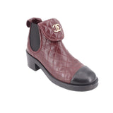 CHANEL quilted burgundy ankle bootie with logo cap toe and low block heel