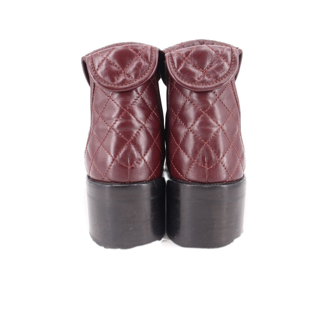CHANEL quilted burgundy booties with quilted back and low block heel