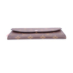 LOUIS VUITTON Emilie wallet open, showing interior and snap flap