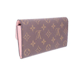 LOUIS VUITTON Emilie wallet in monogram canvas with pink leather side panel