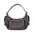 MIU MIU black leather pocket shoulder bag with top handle, side pockets, and gold hardware