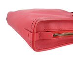 Red Balenciaga Reporter crossbody bag corner detail with zipper and stitched trim
