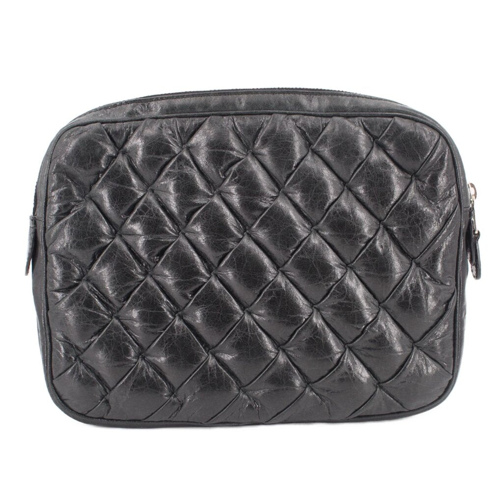 BALENCIAGA quilted black leather pouch with diamond stitching and zip closure