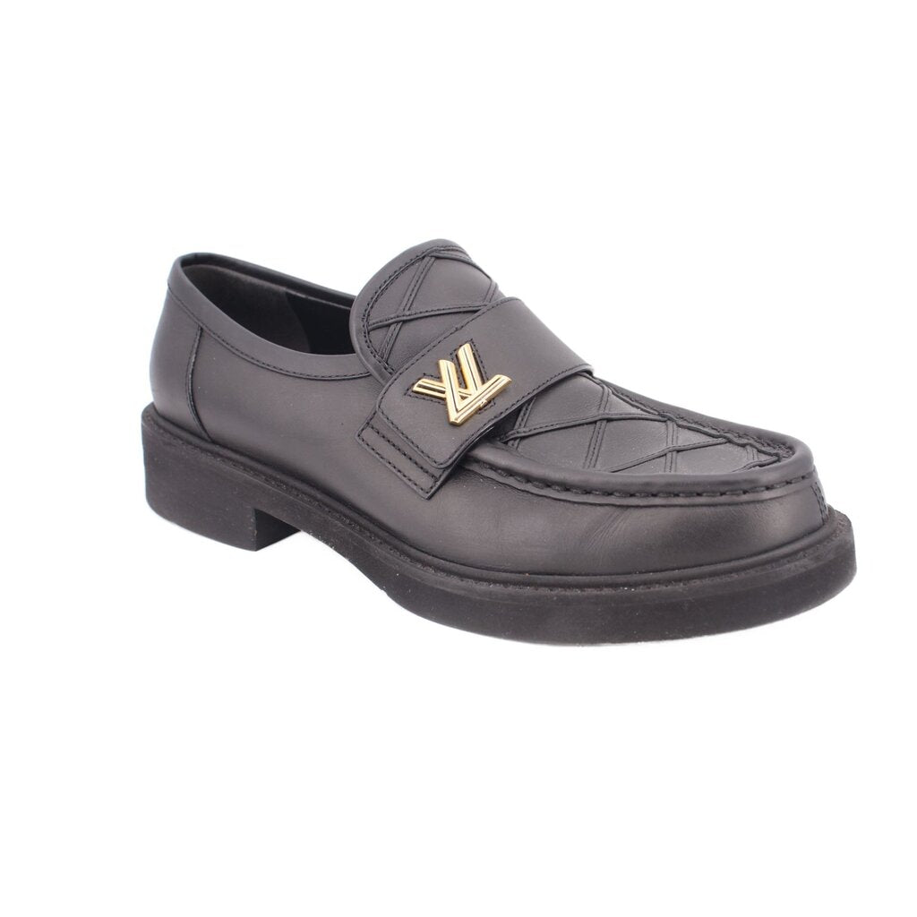 Black leather Academy loafers with gold LV-style buckle ornament