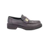Black leather loafers with gold LV-style logo buckle and stitched apron