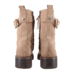 Tan suede combat boots back view with pull-tab accents and chunky lug heel