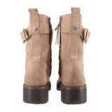 Tan suede combat boots back view with pull-tab accents and chunky lug heel