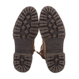 Rubber lug boot soles with deep traction tread at toe and heel