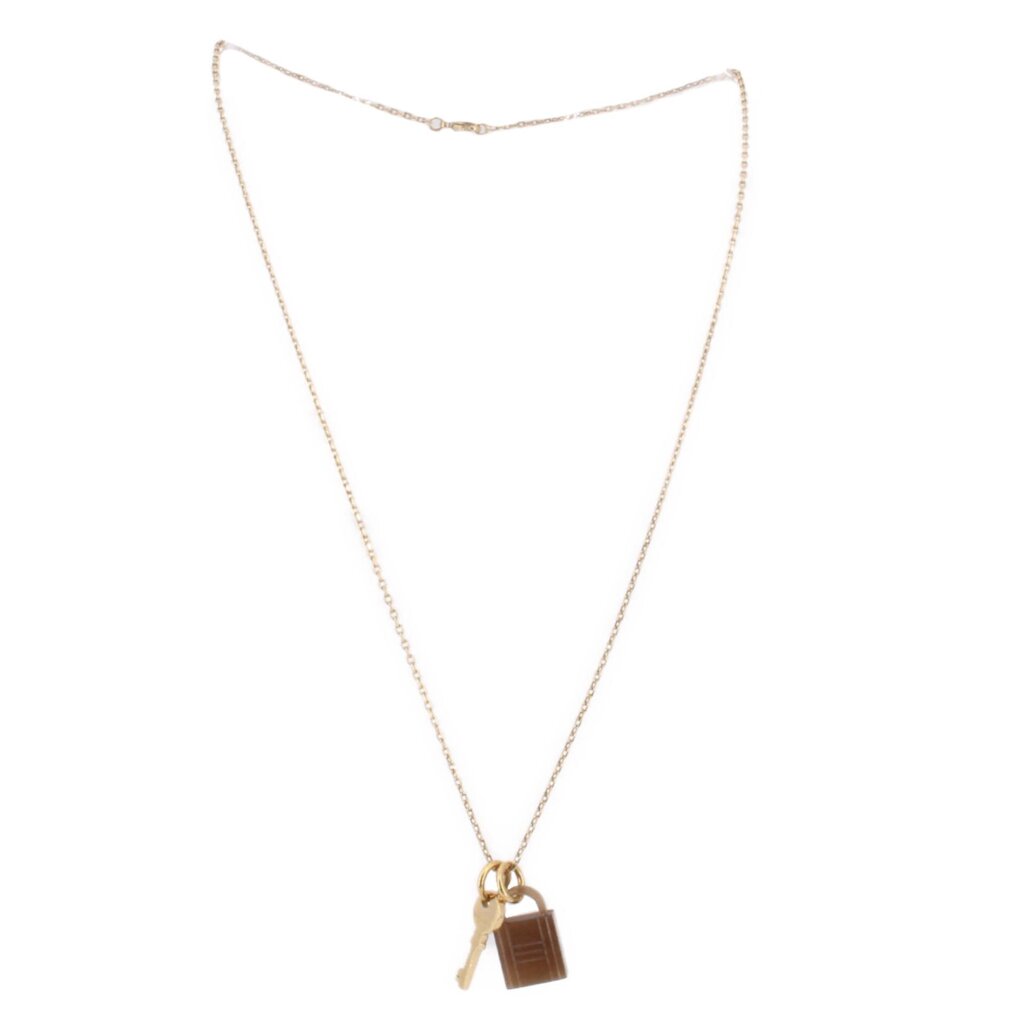 Gold-tone padlock necklace with brown lock charm and key pendant on thin chain