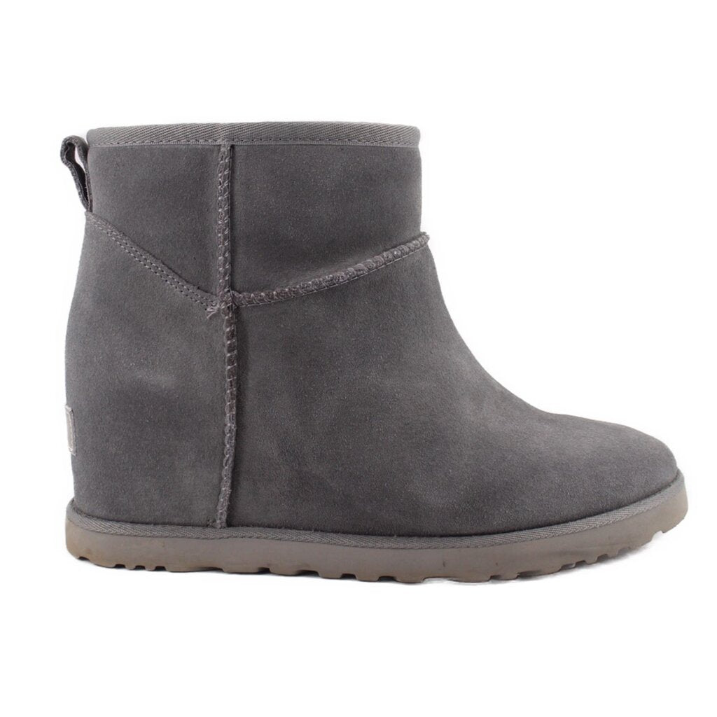Gray suede ankle bootie with side seam and stitched upper