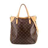 Monogram tote crossbody bag with tan handles and dark brown body, leather trim