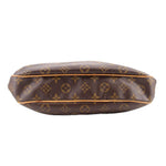 Monogram tote crossbody bag underside view with rounded base and dark brown patterned leather