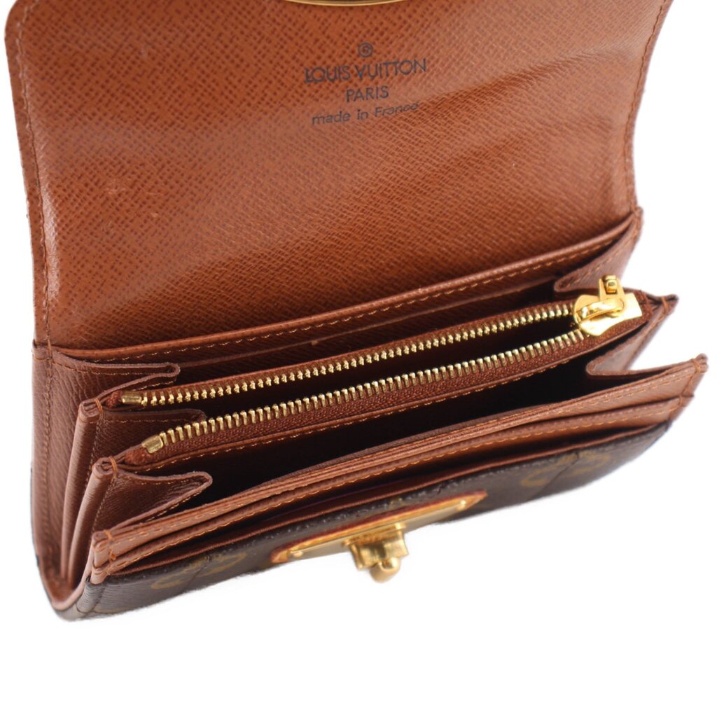 Compact wallet interior with LV logo and zip pocket, brown leather