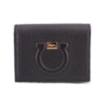 Black textured leather Gancino city wallet with gold-tone emblem on front
