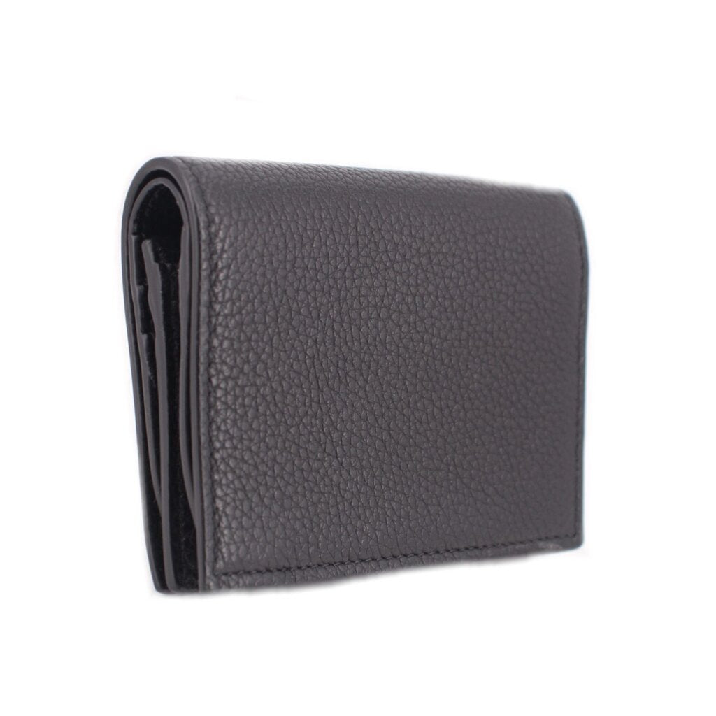 Black leather wallet with side edge detail and textured grain finish