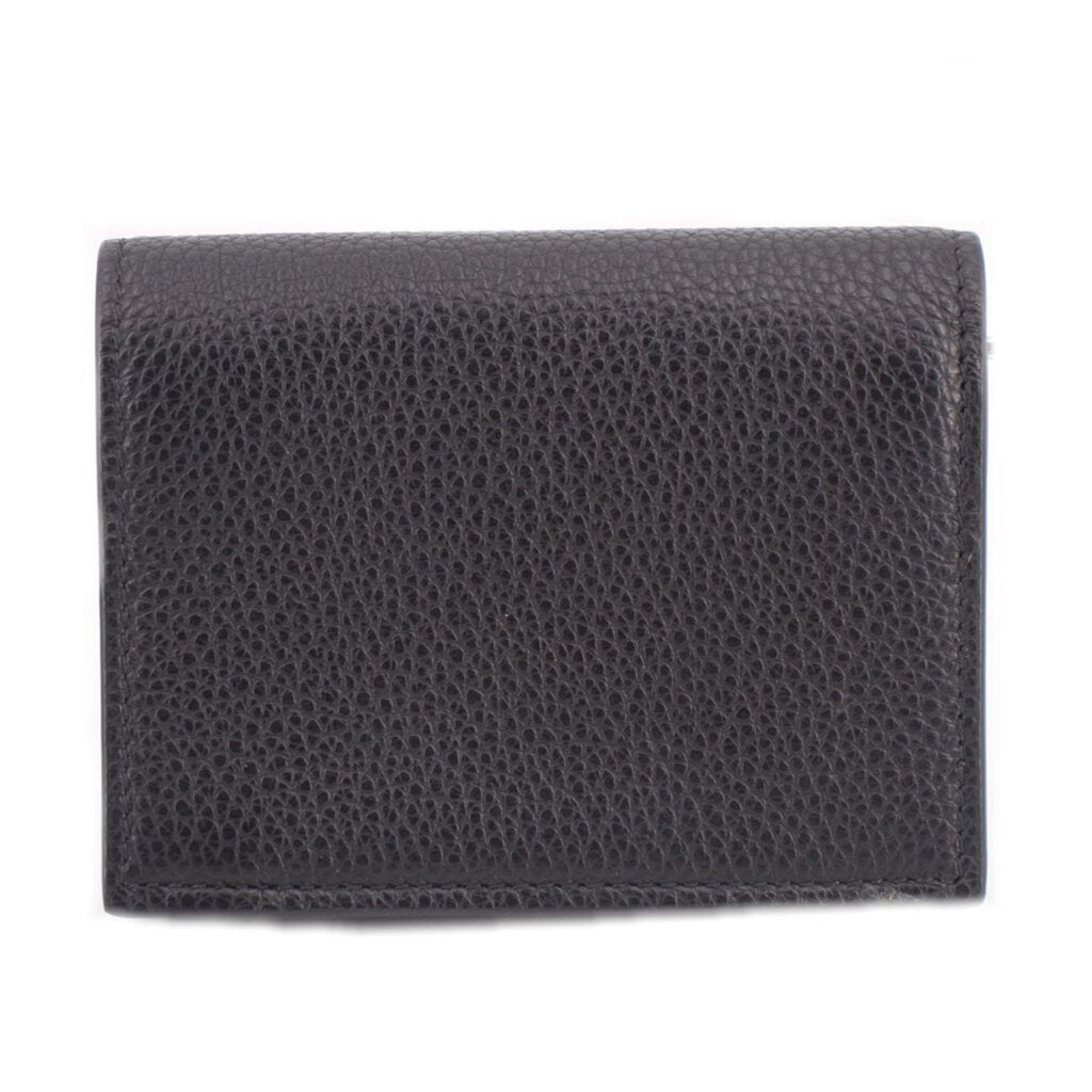 Black textured leather wallet back panel with clean, minimal design