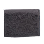 Black textured leather wallet back panel with clean, minimal design