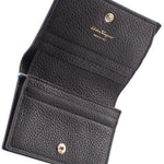 Black leather wallet interior with card slots and snap-button hardware