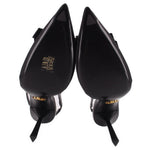 Prada black slingback heels close-up with heel logo and pointed sole