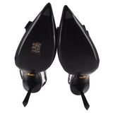Prada black slingback heels close-up with heel logo and pointed sole