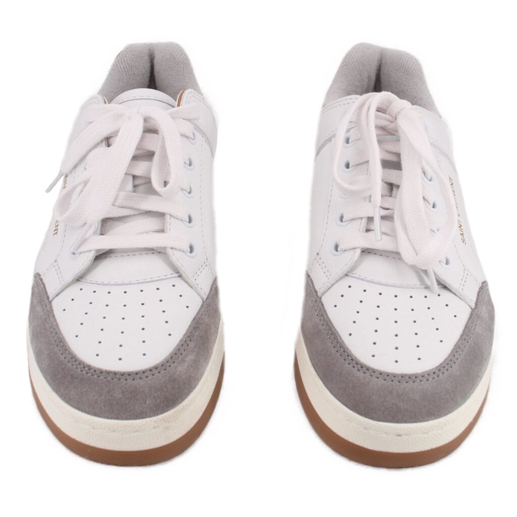 Pair of white sneakers with gray toe and side panels, lace-up design, and gum sole