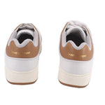 White sneakers with gray lining and heel tab, lace-up style, and Saint Laurent logo