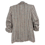 Back view of white/red tweed blazer with frayed hem and three-quarter puff sleeves