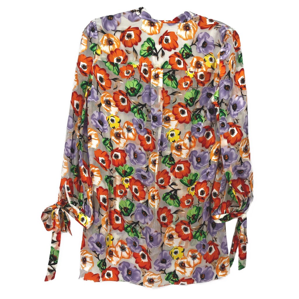Floral print blouse in orange and lavender with tie cuffs and button placket