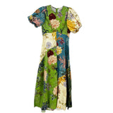 Green and cream floral midi dress with puff sleeves and buttoned keyhole