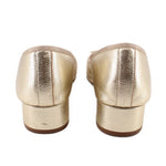 Metallic gold ballet flats with closed heel and stitched back seam