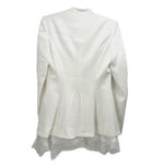 Two-button white blazer back view with tailored seams and lace-trim hem
