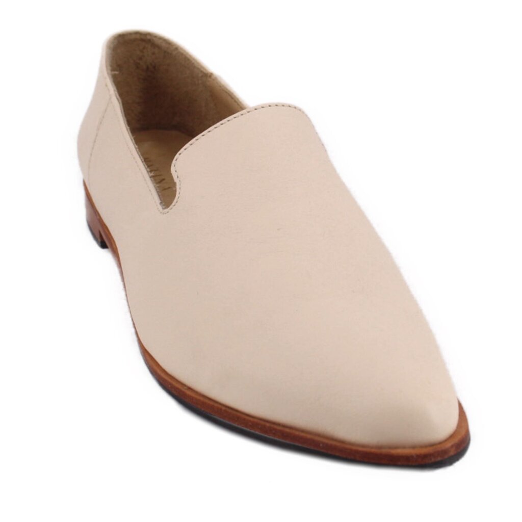 Cream pointed slip-on flats with brown leather sole